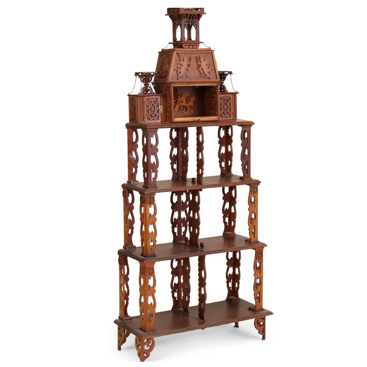 Wooden etagere with intricate carvings on a white background
