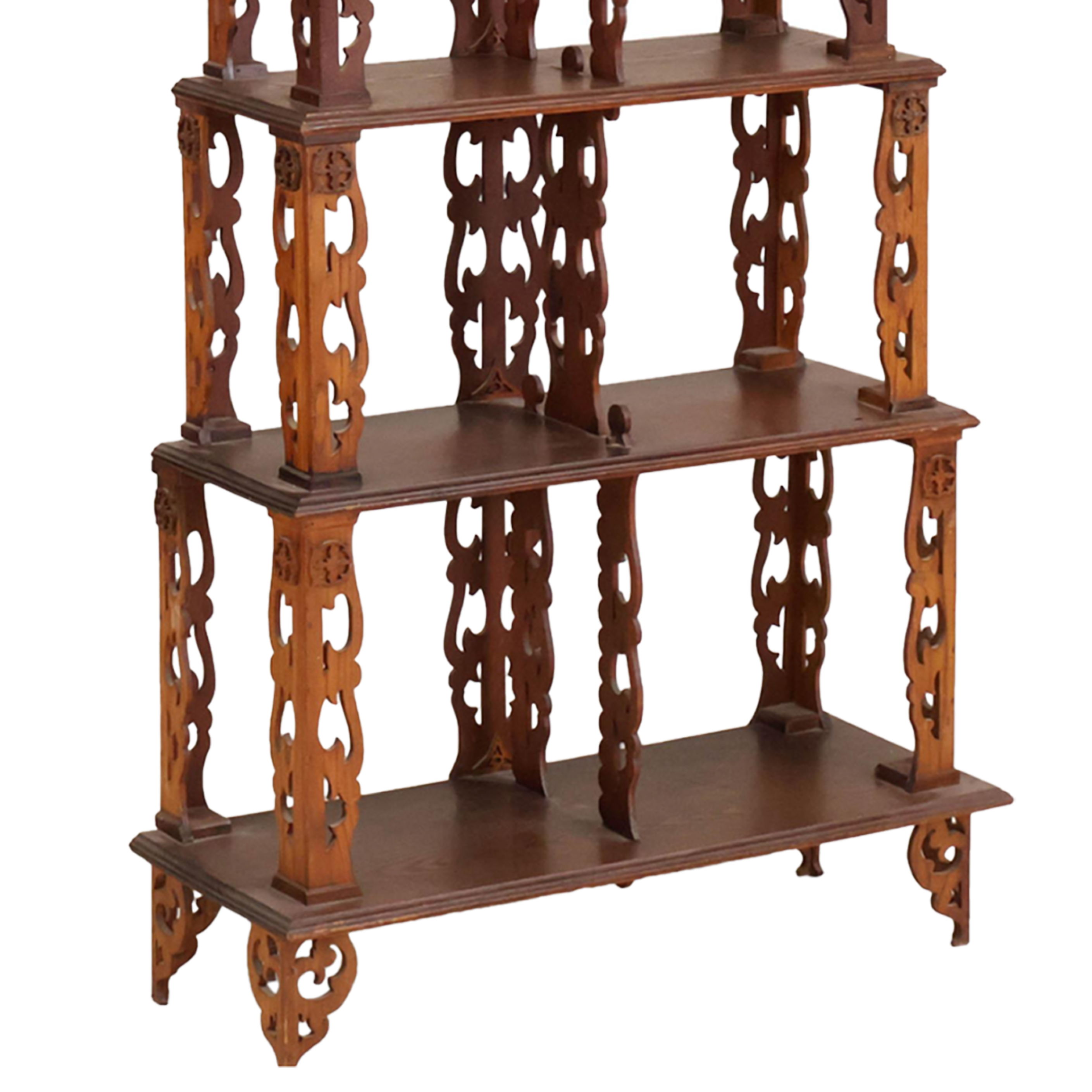 Wooden shelf with intricate carvings on a white background